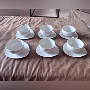 6 porcelain teacups with triangular saucers